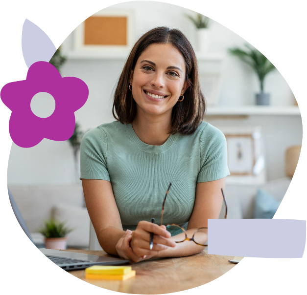 Woman at her desk smiling