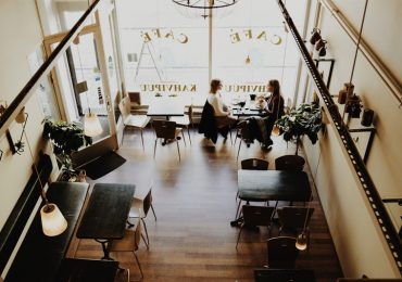 Canva - People at a Cafe (1)